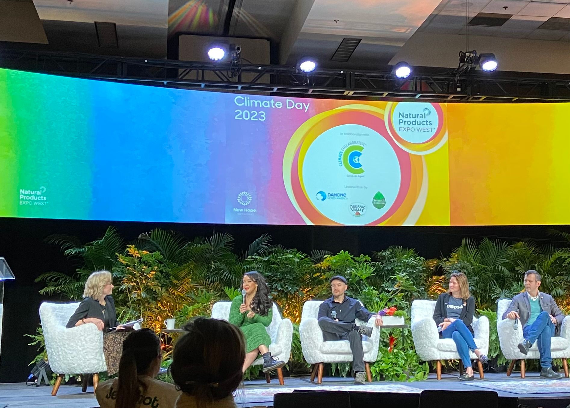 Julia Collins, founder of Moonshot, speaking at Expo West Climate Day 2023, on stage with four other people